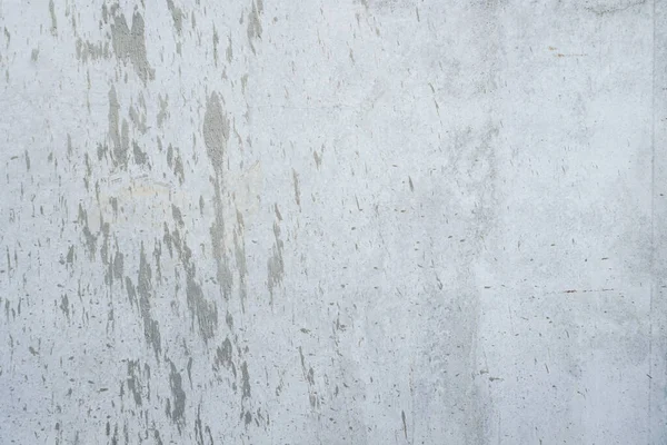 Arka plan ya da duvar kağıdı olarak pürüzsüz gri beton duvar dokusu. Sert desenli beton duvarı kapatın. Çimento dokusu.