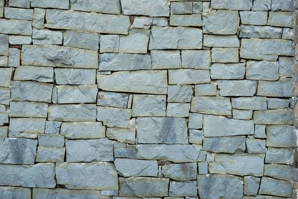 Stone wall texture. Natural grey rocks pattern. Natural stone wall texture for background