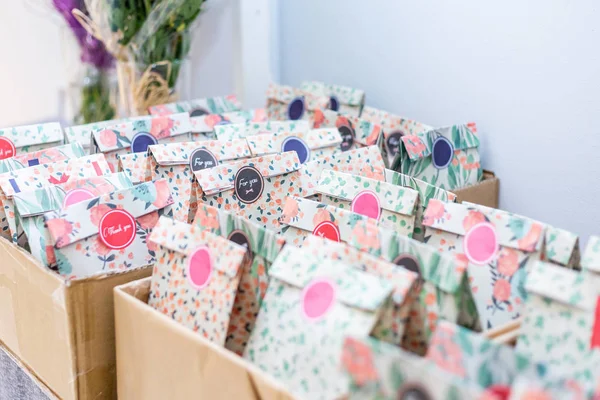wedding gifts for the guests with a sticker that says \