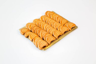 moon cookies on a gold tray with white background