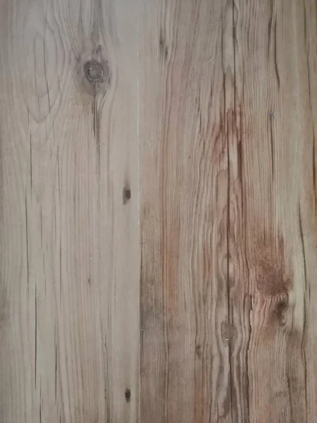 Board, wood stove. Wooden door, background. Color pear. Repair. House.