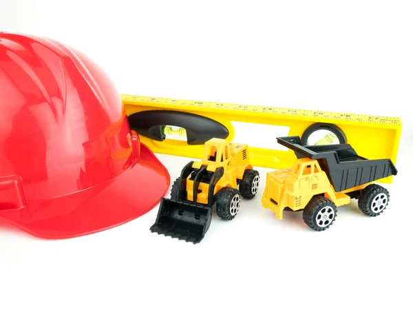 Capacete Segurança Vermelho Com Caminhão Basculante Brinquedo Bulldozers Conceito Construção — Fotografia de Stock