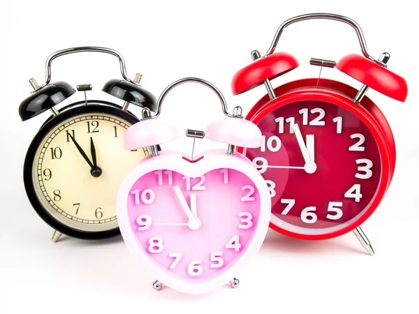 Három Alarm Clock Piros Rózsaszín Fekete Elszigetelt Fehér Background — Stock Fotó