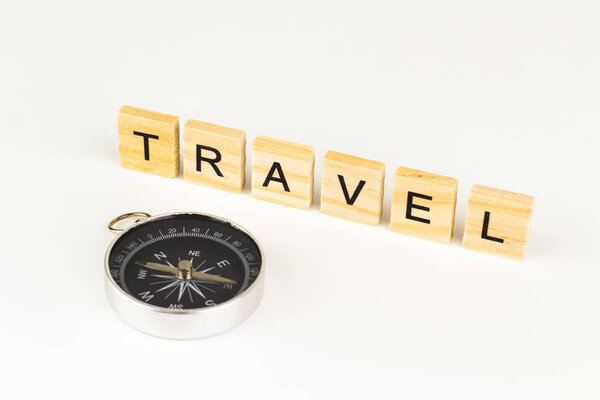 Travel Word In Wooden Cube with compass.
