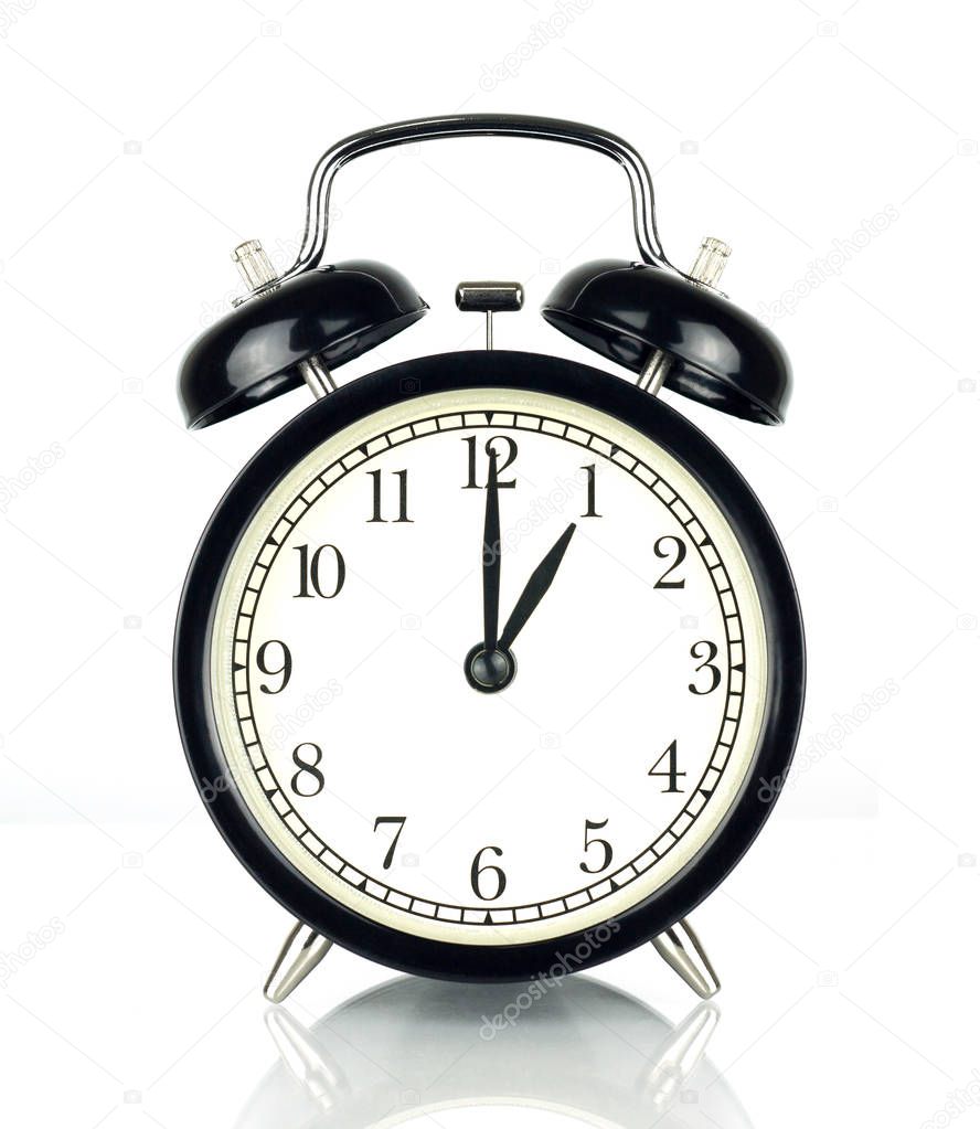 Alarm Clock isolated on white, in black and white, showing one o'clock.