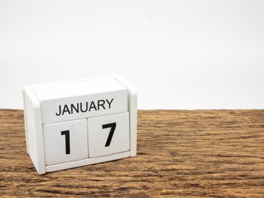 17 Ocak küp ahşap takvim kış günü, boşaltmak metin için vintage ahşap ve beyaz zemin üzerine beyaz.