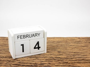 Kış günü, boşaltmak metin, Sevgililer günü için vintage ahşap ve beyaz zemin üzerine 14 Şubat beyaz küp ahşap takvim.