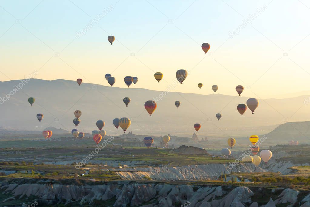Colorful Hot air balloon flying over Red valley at Cappadocia