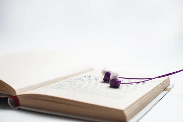 Audio Book Concept, Headphones and book, Relax with headphone and book, listen to audio book