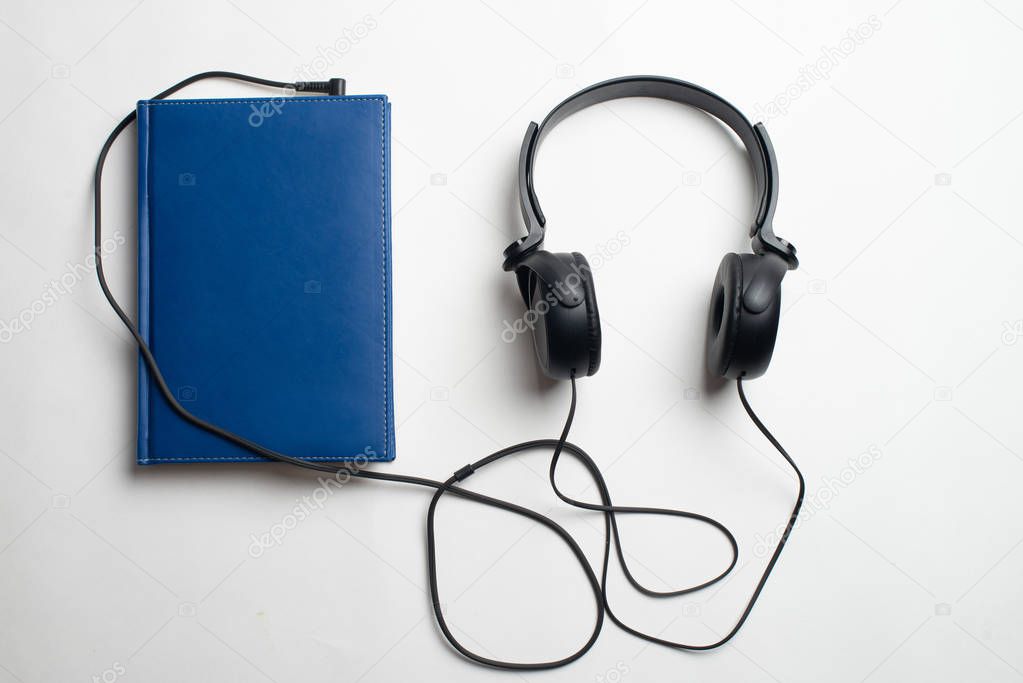 Audio Book Concept, Headphones and book, Relax with headphone and book, listen to audio book