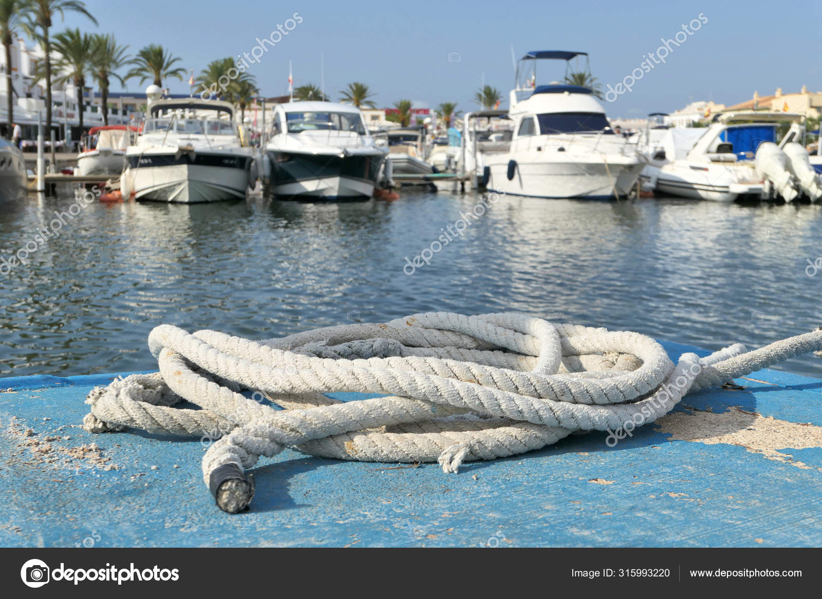 A thick hawser rope in spanish marina of Menorca island. Stock Photo by  ©Studiobarcelona 315993220