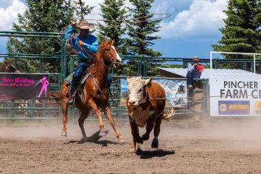 Cowboys and Rodeo Games in Pincher Creek Canada, 15. June 2019 clipart