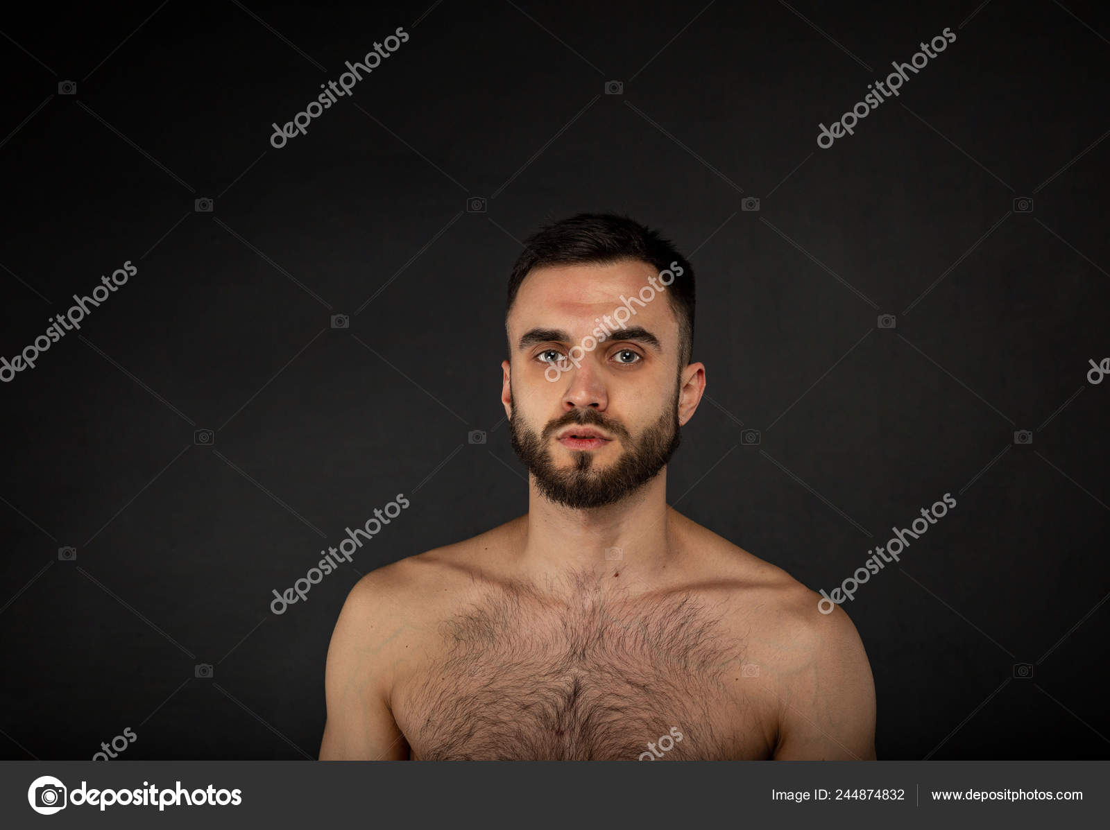 Young Handsome Bearded Man Or Hipster Guy With Serious Face And