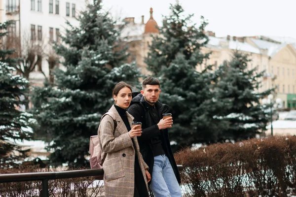 Portrait of beautiful young couple outside in the city center — Stock Photo, Image