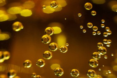 Şampanya kadehinde köpükler, yakın plan. Geçmişi. Doku