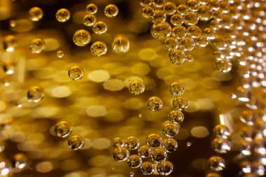 Şampanya kadehinde köpükler, yakın plan. Geçmişi. Doku