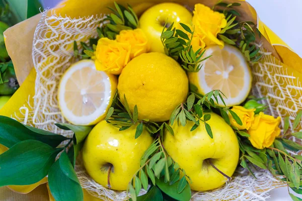 Bright beautiful stew of fruits and flowers close-up