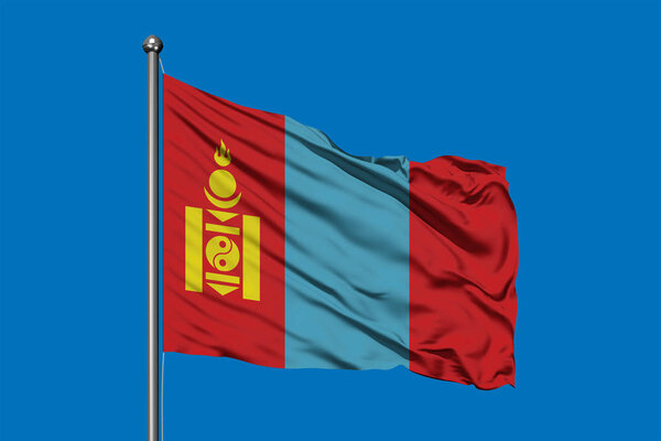 Flag of Mongolia waving in the wind against deep blue sky. Mongolian flag.