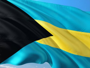 Bahamalar derin mavi gökyüzü karşı rüzgarda sallayarak bayrak. Yüksek kaliteli kumaş.