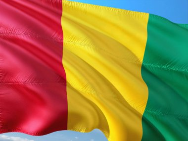 Gine derin mavi gökyüzü karşı rüzgarda sallayarak bayrak. Yüksek kaliteli kumaş.