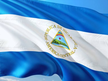 Nikaragua derin mavi gökyüzü karşı rüzgarda sallayarak bayrak. Yüksek kaliteli kumaş.