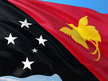 Papua Yeni Gine derin mavi gökyüzü karşı rüzgarda sallayarak bayrak. Yüksek kaliteli kumaş.