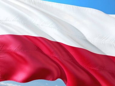 Polonya derin mavi gökyüzü karşı rüzgarda sallayarak bayrak. Yüksek kaliteli kumaş.
