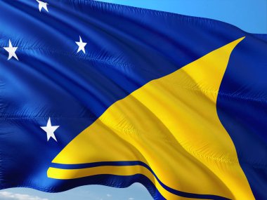 Tokelau derin mavi gökyüzü karşı rüzgarda sallayarak bayrak. Yüksek kaliteli kumaş.