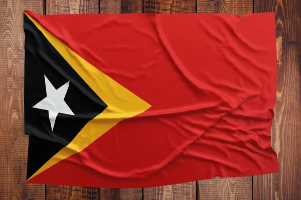 Flag East Timor Wooden Table Background Wrinkled East Timorese Flag — Stock Photo, Image