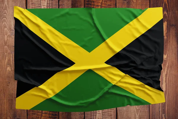 Flaga Jamajki Tle Drewniany Stół Widok Góry Pomarszczony Flaga Jamajki — Zdjęcie stockowe