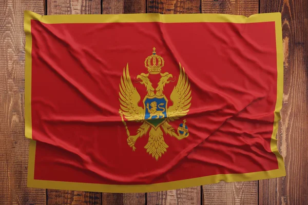 Vlajka Černé Hory Dřevěný Stůl Pozadí Vrásčitá Černohorská Vlajka Pohled — Stock fotografie