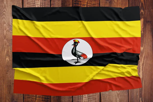 Bandeira Uganda Fundo Mesa Madeira Vista Superior Bandeira Ugandense Enrugada — Fotografia de Stock