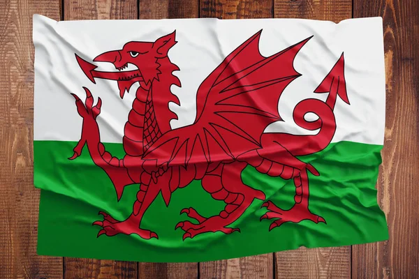 Vlag Van Wales Een Houten Tafel Achtergrond Gerimpelde Galler Bovenaanzicht — Stockfoto