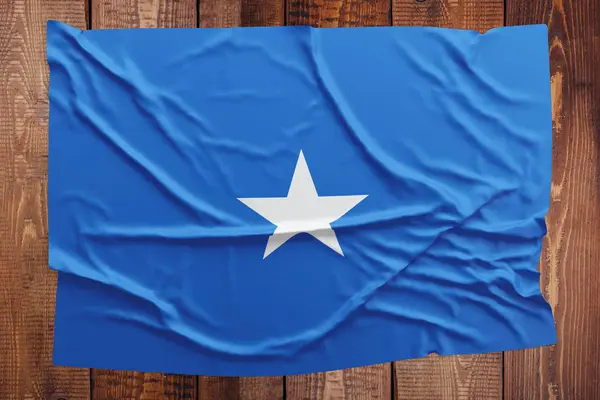 Bandera Somalia Sobre Fondo Mesa Madera Bandera Somalí Arrugada Vista — Foto de Stock