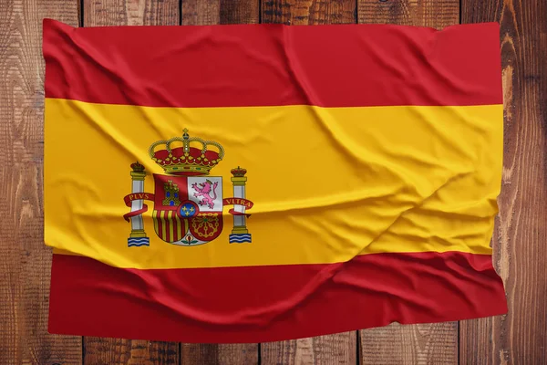 Flagge Spaniens Auf Einem Holztischhintergrund Faltige Spanische Flagge Von Oben — Stockfoto