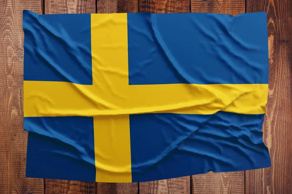 Flaga Szwecji Tle Drewniany Stół Pomarszczony Flagą Szwedzką Widok Góry — Zdjęcie stockowe