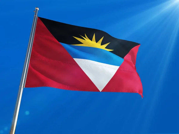 Antigua Och Barbuda Nationella Flagga Vajande Stolpe Mot Djupa Blå — Stockfoto