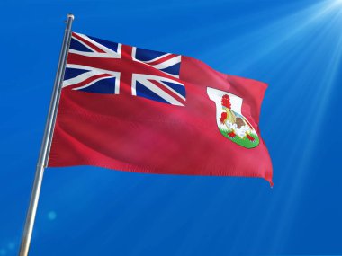 Bermuda bayrak Ulusal sallayarak derin mavi gökyüzü arka plan karşı kutup. Yüksek çözünürlüklü