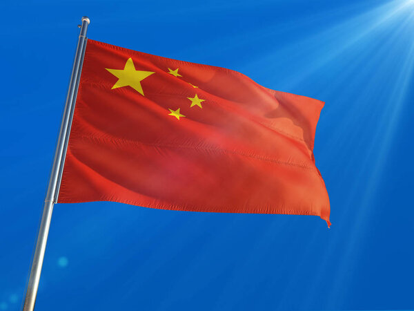 China National Flag Waving on pole against deep blue sky background. High Definition