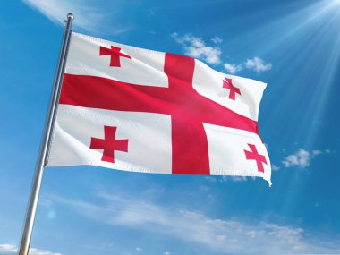 Gürcistan bayrağı Ulusal sallayarak güneşli mavi gökyüzü arka plan karşı kutup. Yüksek çözünürlüklü