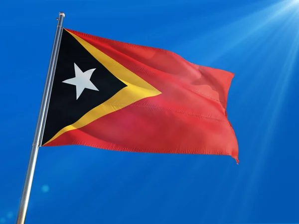 Timor Oriental Bandera Nacional Ondeando Poste Contra Fondo Azul Profundo —  Fotos de Stock