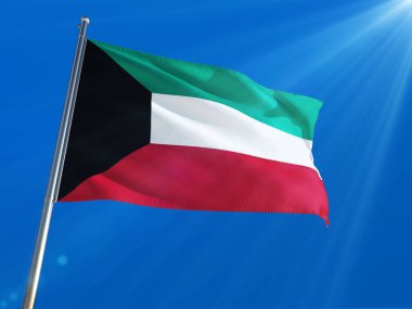 Kuveyt bayrağı Ulusal sallayarak derin mavi gökyüzü arka plan karşı kutup. Yüksek çözünürlüklü