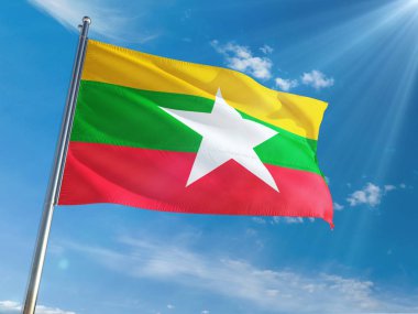 Myanmar - Burma ulusal bayrak sallayarak güneşli mavi gökyüzü arka plan karşı kutup. Yüksek çözünürlüklü