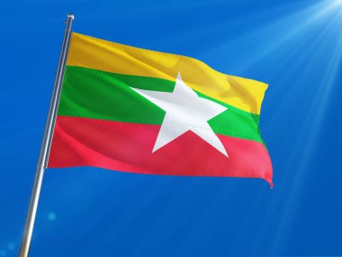 Myanmar - Burma ulusal bayrak sallayarak derin mavi gökyüzü arka plan karşı kutup. Yüksek çözünürlüklü