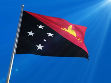 Papua Yeni Gine bayrağı Ulusal sallayarak derin mavi gökyüzü arka plan karşı kutup. Yüksek çözünürlüklü