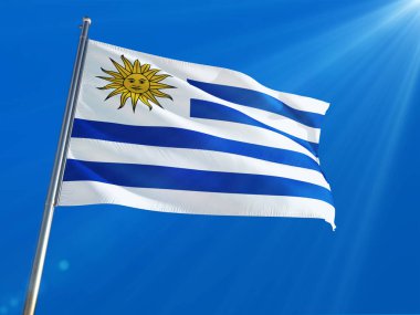 Uruguay bayrağı Ulusal sallayarak derin mavi gökyüzü arka plan karşı kutup. Yüksek çözünürlüklü