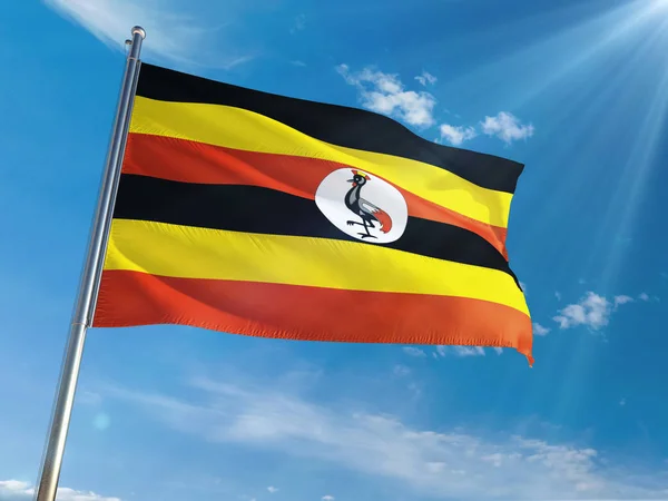 Oeganda Nationale Vlag Wapperend Paal Tegen Zonnige Blauwe Hemelachtergrond High — Stockfoto