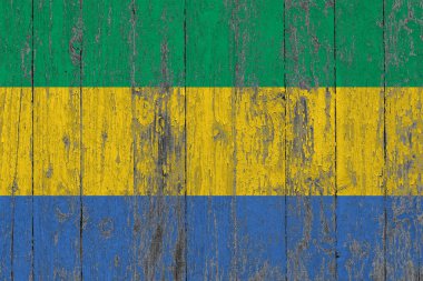 Gabon Cumhuriyeti bayrağı ahşap doku arka plan aşınmış boyanmış.