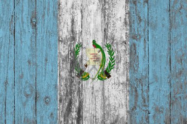 Guatemala bayrağı ahşap doku arka plan aşınmış boyanmış.