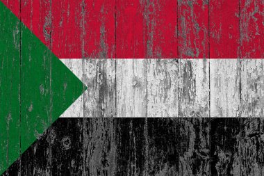 Sudan bayrağı ahşap doku arka plan aşınmış boyanmış.